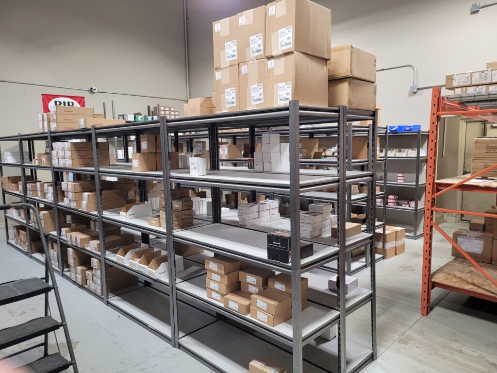 Rows of building automation and HVAC control products in stock at the Canada Controls branch in Regina, Saskatchewan